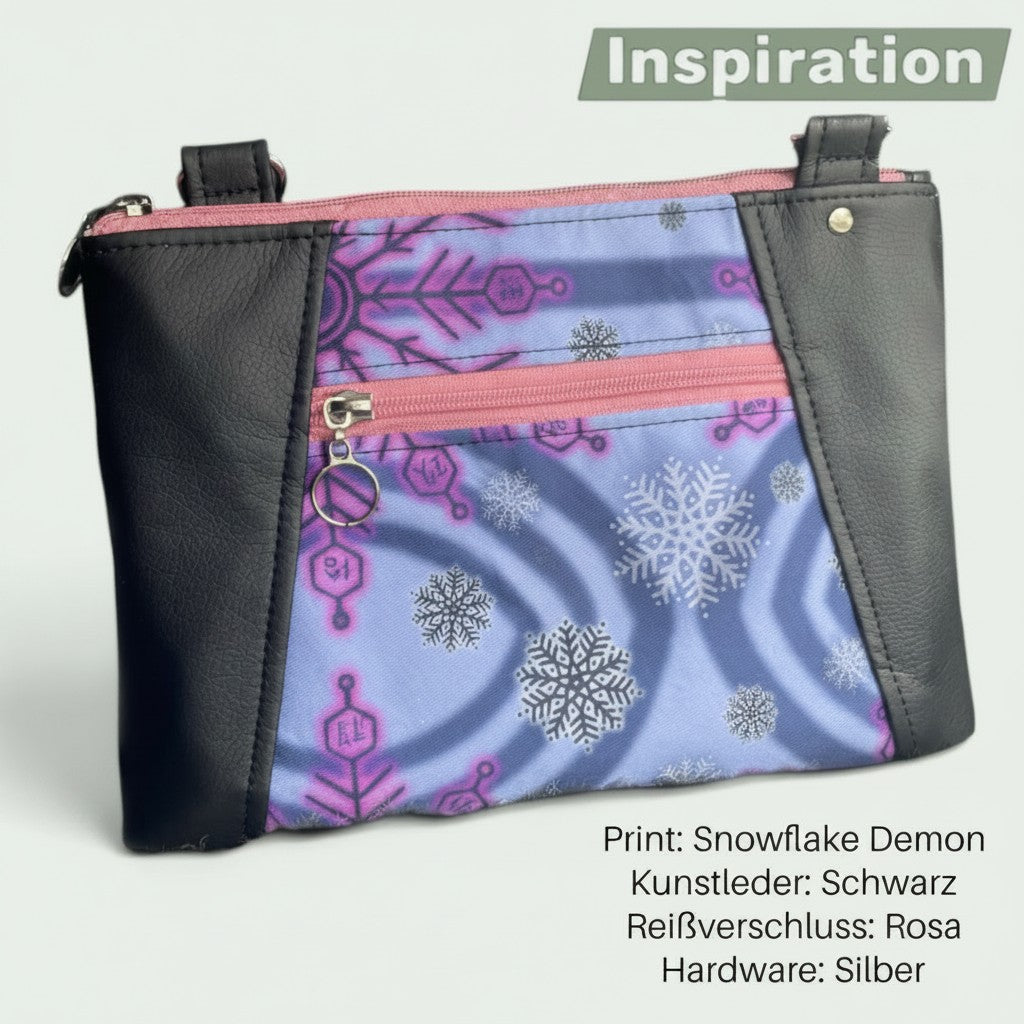 Schneckenschmiede Umhängetasche Sunshine mit Snowflake Demon Print, schwarzen Kunstleder-Akzenten und rosa Reißverschluss