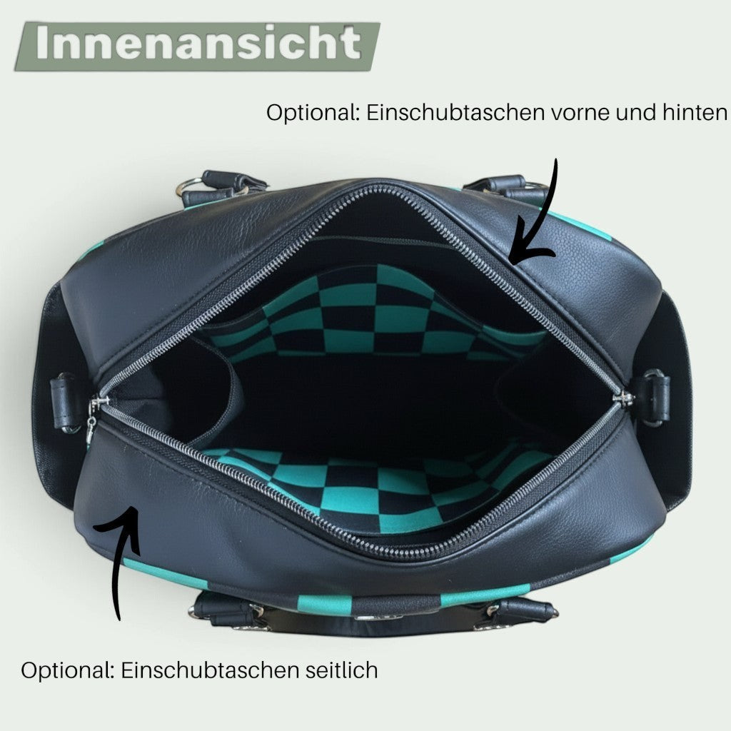 Schneckenschmiede Belle Baby Windeltasche mit grün-schwarzem Karomuster, Kunstlederdetails und vielen Außentaschen.
