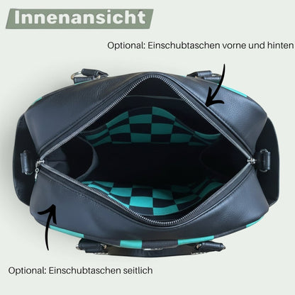 Schneckenschmiede Belle Baby Windeltasche mit grün-schwarzem Karomuster, Kunstlederdetails und vielen Außentaschen.