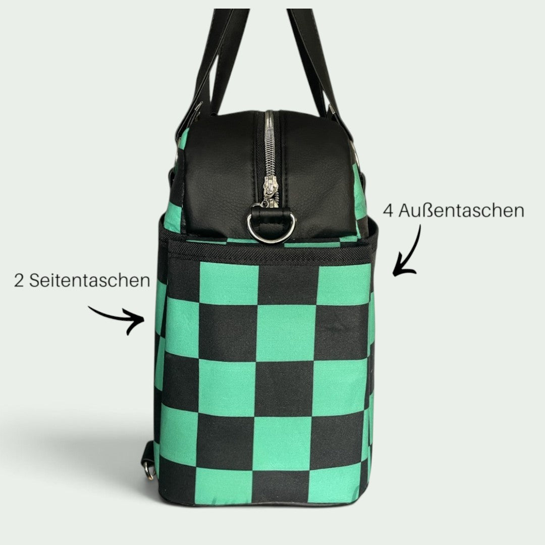Schneckenschmiede Belle Baby Windeltasche mit grün-schwarzem Karomuster, Kunstlederdetails und praktischen Außentaschen