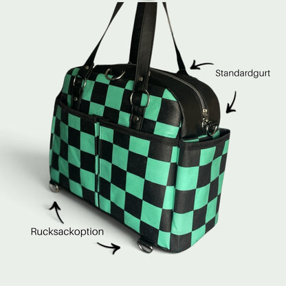 Schneckenschmiede Belle Baby Windeltasche im grün-schwarzen Schachbrettmuster mit Kunstlederdetails und Rucksackoption