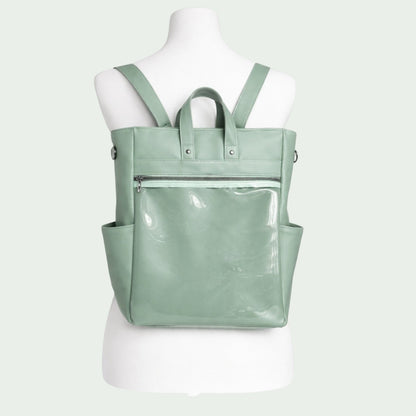 Schneckenschmiede ITA Rucksack in Salbeigrün aus Kunstleder mit transparentem Frontfach für Pins und Buttons