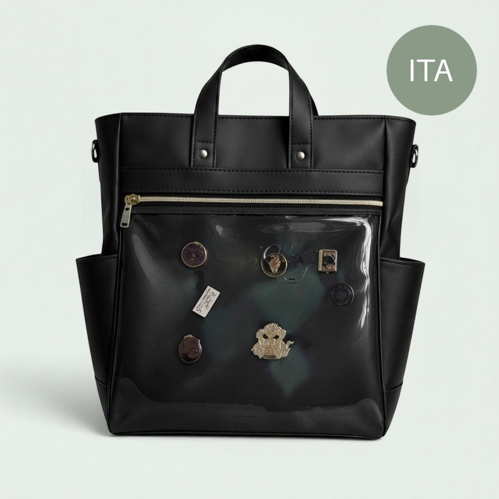 Schwarzer Schneckenschmiede ITA Rucksack aus Kunstleder mit transparentem Frontfach zur Präsentation von Pins.