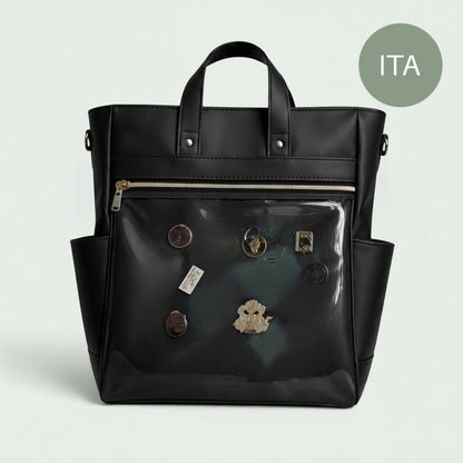 Schwarzer Schneckenschmiede ITA Rucksack aus Kunstleder mit transparentem Frontfach zur Präsentation von Pins.