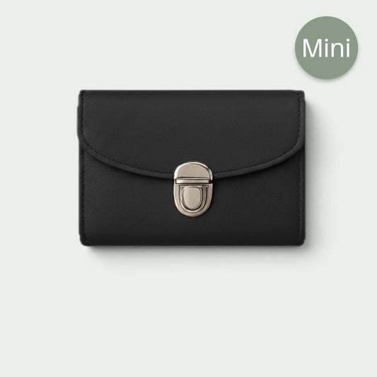 Schneckenschmiede Mini Portemonnaie in Schwarz mit silbernem Steckverschluss und kompaktem Design