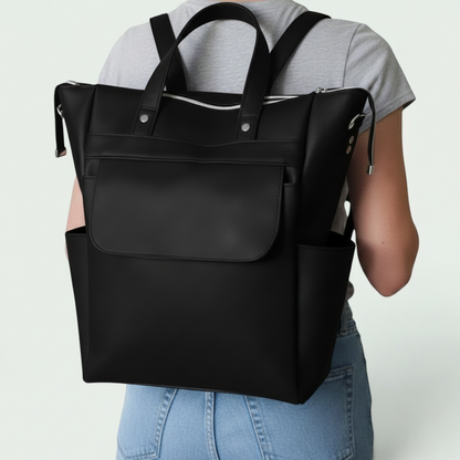 Schneckenschmiede 2-in-1 Rucksack mit schwarzem Kunstleder, Fronttasche und Reißverschluss. Convertible