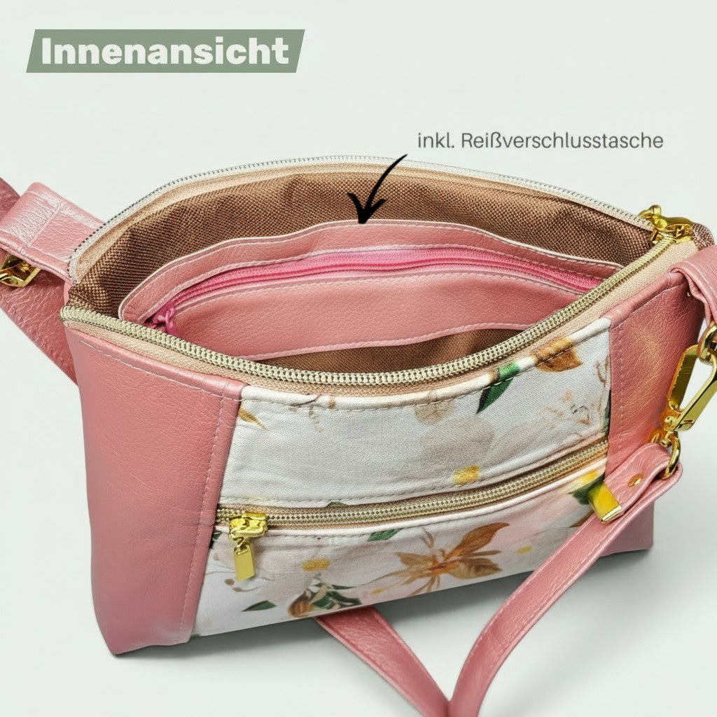 Schneckenschmiede Sunshine Umhängetasche Innenansicht mit Reißverschlussfach, rosa Kunstleder und Blumenstoff