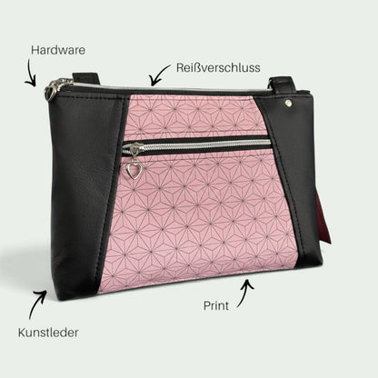 Schneckenschmiede Umhängetasche Sunshine mit rosa geometrischem Muster und schwarzen Kunstleder-Akzenten